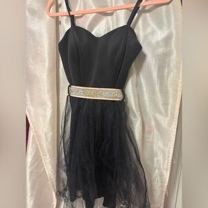 Elegant Black Dress with Embellished Belt